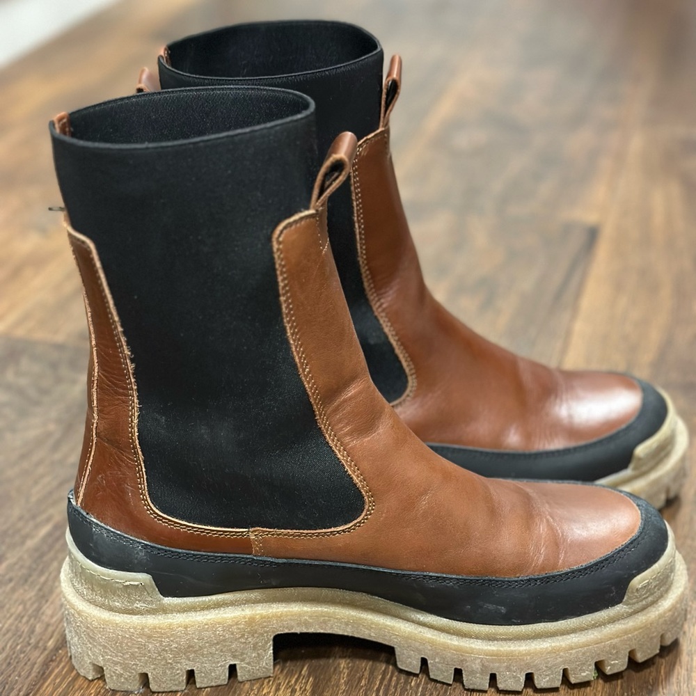 Trendy Lug Sole boots go with everything! Excellent quality. Barely worn. Enjoy